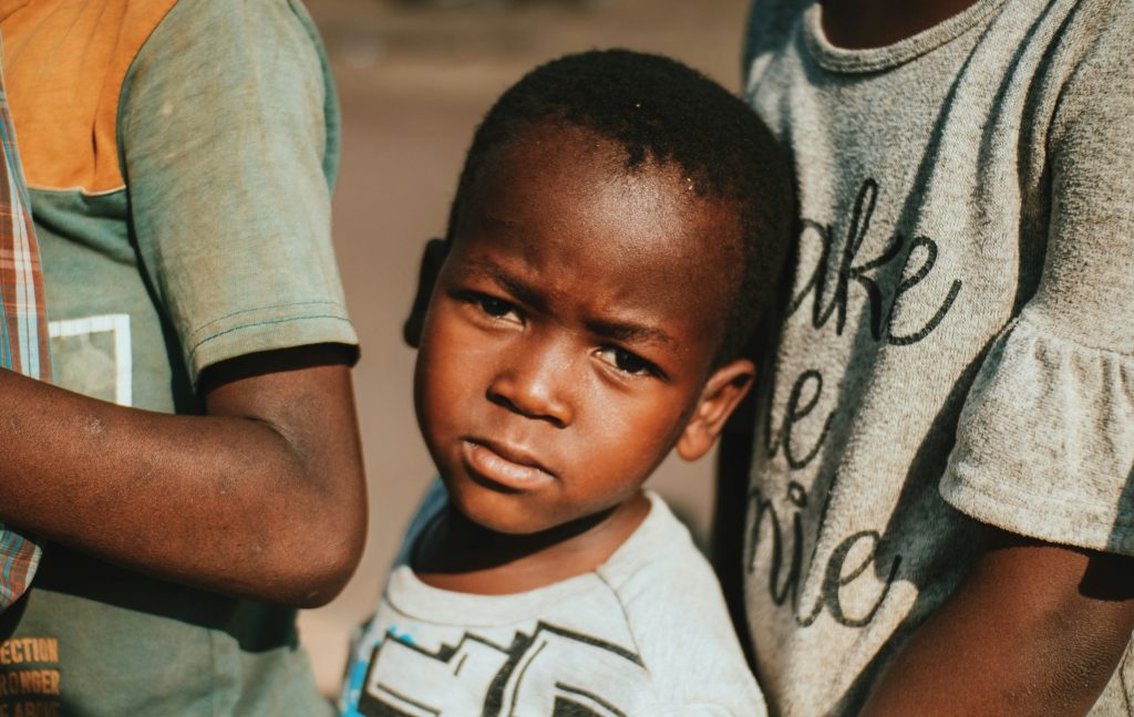 cropped smaller, africa, boy, child, sad, serious, face